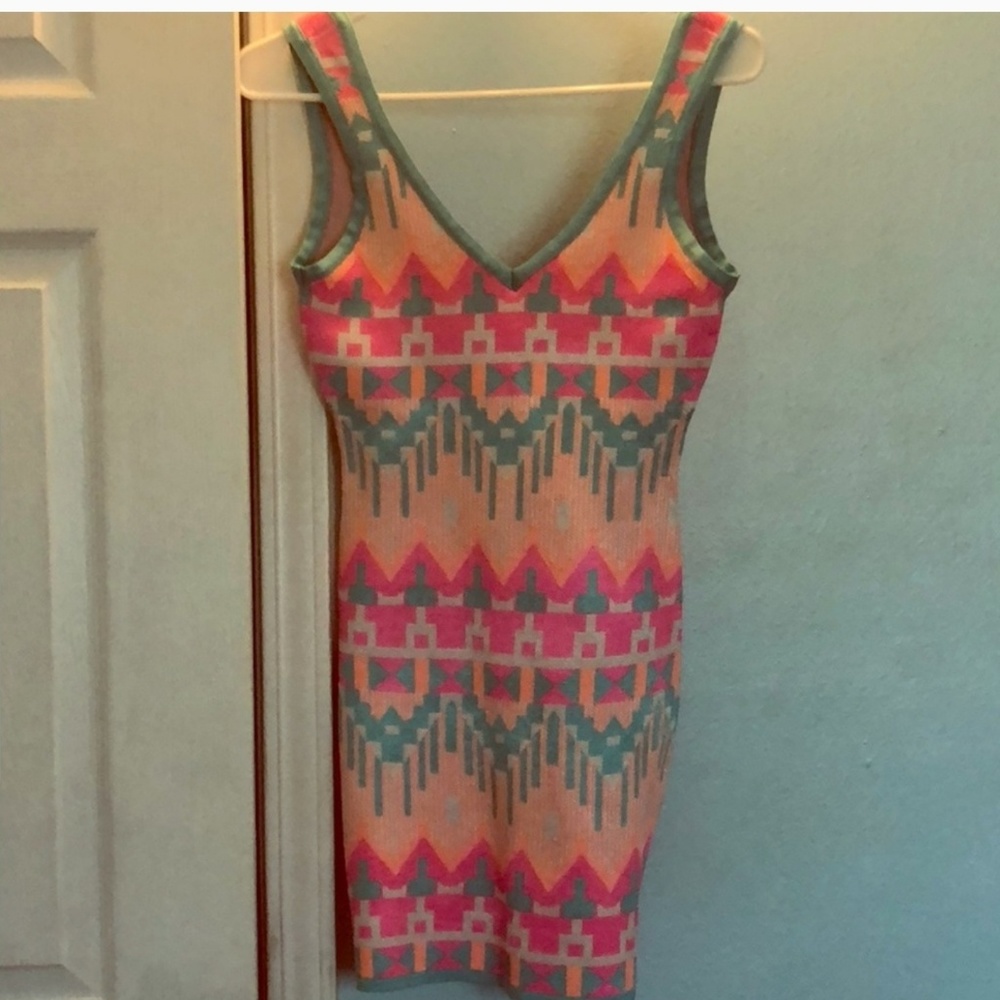 2B Bebe Aztec print knit mini dress.
